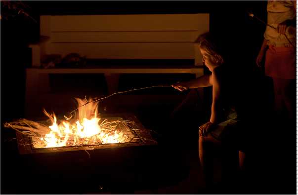 Roasting marshmallows at the vacation home rental outside of Orlando