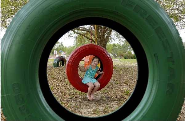 Playground and tire swings and Orlando, Florida area's Sweet Escape luxury vacation home rental
