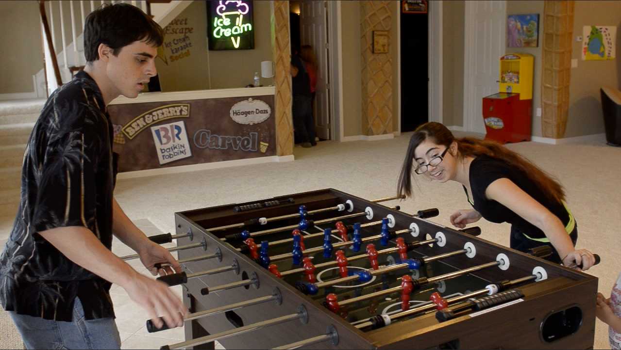 Play foosball at The Sweet Escape VRBO's video game arcade